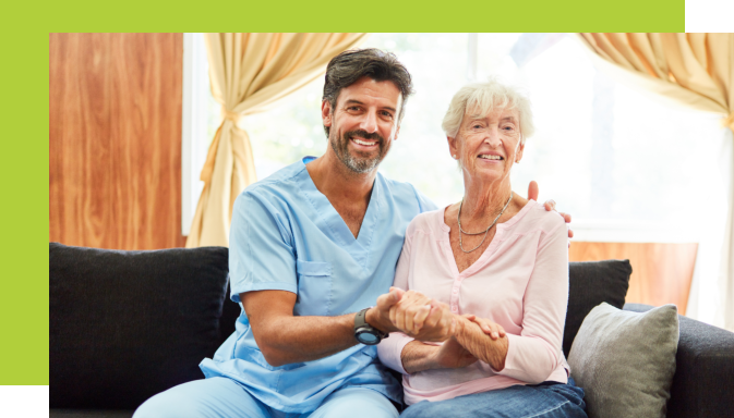 elderly woman and her male caregiver